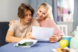 Parent helping student with homework productively