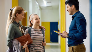 Teacher working with engaged students